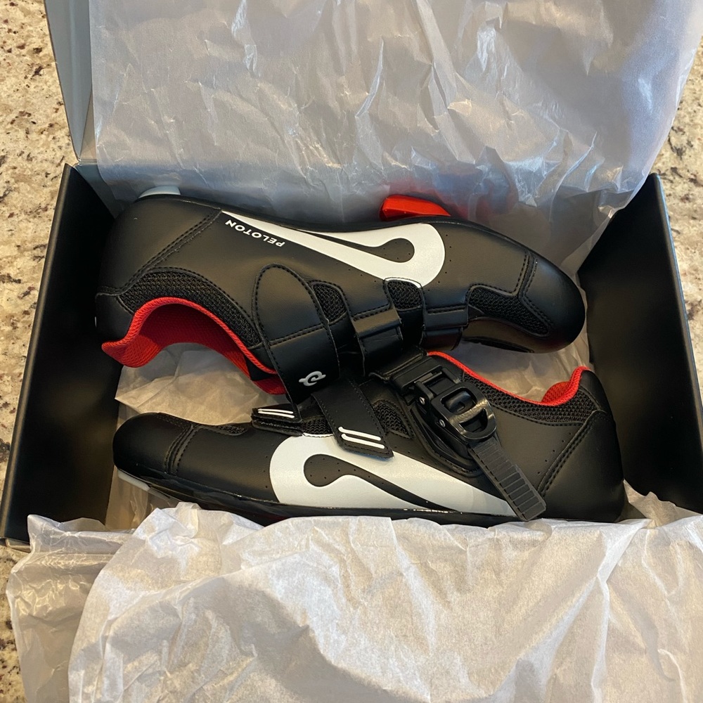 Peloton size 40 cycling shoes with clips.
